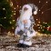 Santa Claus "in a suit with sequins and with a flashlight" 30 cm, silver