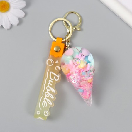 A plastic keychain with a carbine, a strap "Ice Cream Horn" Water with decor1.8x5.3x5.6 cm-1