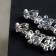 Clips "openwork" drops with curls, the color is white-idle in silver