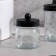 A set of bathroom accessories, 4 items (dispenser, glass for brushes, 2 jars), black color
