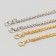 Chain with 2 carbines a link thickness 0.1 cm 0.4x60 cm gold/silver mix