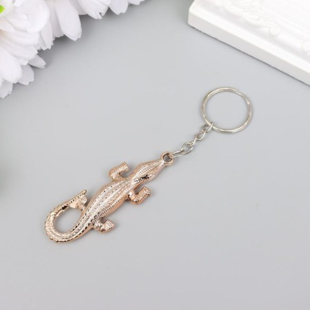 A plastic key under the Golden Crocodile metal 5.4x2x0.7 cm-1