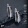Earrings ceramics "path", black and white color in silver