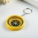 A keychain with a compass Round mix 4.5x4.5x1 cm