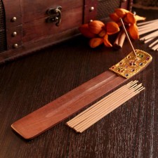 Karma set of 10 sticks with a wooden incense stand