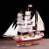 The ship souvenir "conductor", 3 masts, white side, black stand, white sails