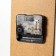 Carty clock is wall-mounted, on canvas, series: City, "Lilac foliage on the bridge" 40x76 cm