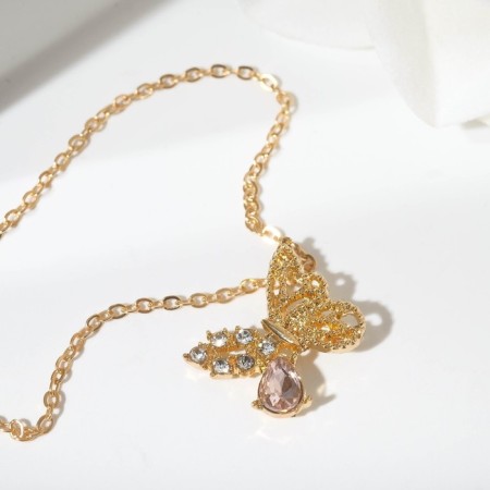 Piece "Butterfly" with rhinestones, white-pink color in gold, 46 cm