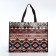 The bag is economic on the button, brown color/multi -colored
