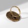 Ring of the "ethnic" patterned circle, black color in black gold, dimensionless
