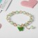 Bracelet Children's "chosen" butterfly, green color in gold