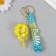 A keychain plastic with a carbine, a strap "Yellow" Water with decor1.8x5.3x5.6 cm