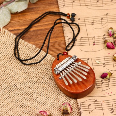 Kalim "pebble" Music Life, 8 reeds, 7 x 5 x 1.8 cm, tree