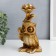 Summary Polystone stand "Filin Genrich Puccity with a flower" Bronze 21x8.5x12 cm