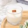 A candle made of soy wax in a glass with a wooden wick "Spring Lundysh", 65 grams