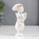 Polystone souvenir "Snowty angel in a pink wreath, on a ball under an umbrella" 8.5x3.8x3 cm