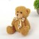 Soft toy "Bear with a bow", color mix