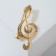 Brooch "Violin key" radiance, white color in gold