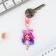 Acrylic keychain "girl" with carbine, 3.2 x 5.3 cm