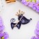 Brooch "Dog" with a crown, black color in gold