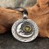 Amulet "Sun and Moon" with a stone topaz, 35x42 mm, metal