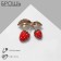 Brooch "Strawberries" on a twig, red color in gold