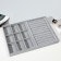 A decoration stand for 9 cells and 11 strips for rings, phlock, 35 × 24 × 3 cm, color gray color