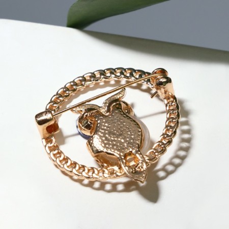 Brooch "Cat Eye" owl, colored in gold-1