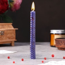 A candle from wax with a rose 