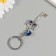 Keychain from the evil eye Metal "Key with the Hot" 2.8x5.7 cm