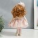 Interior doll "Baby Asya in pink, with a bear" 36x13x15.5 cm