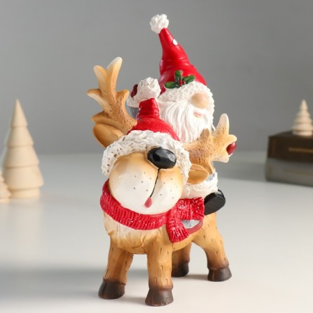 Suvenir Polystone "Santa Claus riding Oleska in a red cap and scarf" 8x14x23 cm-3