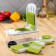 Vegetable engine - Shinkovka with interchangeable nozzles and a shares container, 6 nozzles, 14 × 12.5 × 38.1 cm, white, green color