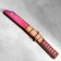 The souvenir is wooden "Tanto knife", in the scabbard, pink