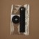 The fastener is sewn for a bag, on a button, made of genuine leather, 13.5 × 2.5 cm, black/silver color