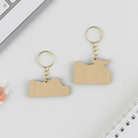 The paired key fobs “Dad Bujet/Mom Rests”, 5.2 x 7.2 cm.-4