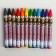 Wax pencils, set 12 colors, height 8 cm, diameter 0.8 cm, transformers