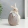 Polystone souvenir "Rabbit with an testicle with a bow" 11x5.5x8.5 cm