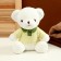 Soft toy "White Bear" in a green jacket, 26 cm