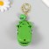 A plastic keychain with a carbine "dinosaurus-zubastik" closes when a tooth is pressed 5x7.5x4.5 cm 1049898