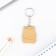 A wooden key keychain "Boys do not apologize", 5 x 3.6 cm