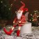 New Year's jester "with wings" sits, moves, 39x14 cm, red
