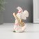 Polystone pigeons in a pink wreath 6*4 cm