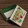 The box is folding, the lid is “Happy New Year” 24 x 17 x 8 cm