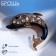 Brooch "Dolphin", white-blue color in gold