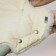 The coupling for the stroller is quilted Elegante, color: Milk