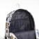 School backpack of textiles on a zipper, 3 pockets, white color