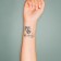 Black Tattoo on the body "Blagily.