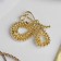 Brooch "Butterfly" pearl, white color in yellow gold