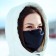 The mask is fabric, reusable, adjustable, packing 2 pcs, black